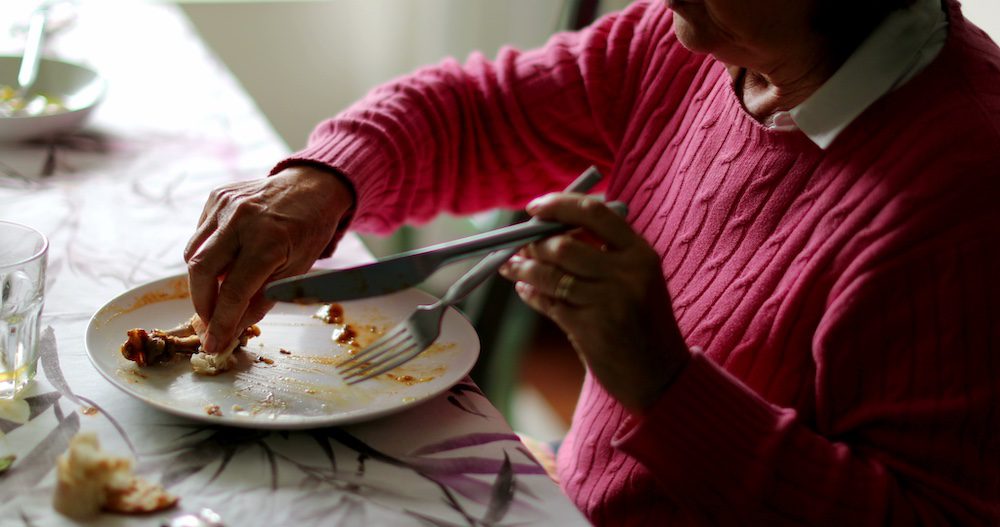 elderly person eating luch representing healthy foods for seniors